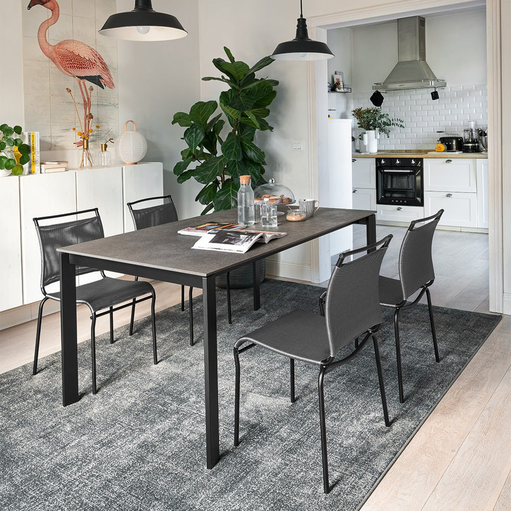 Eminence Metal Extendable Dining Table by Connubia in a styled interior