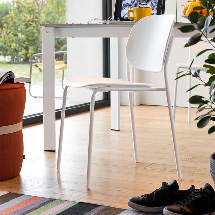Eminence Metal Extendable Dining Table by Connubia in a styled interior