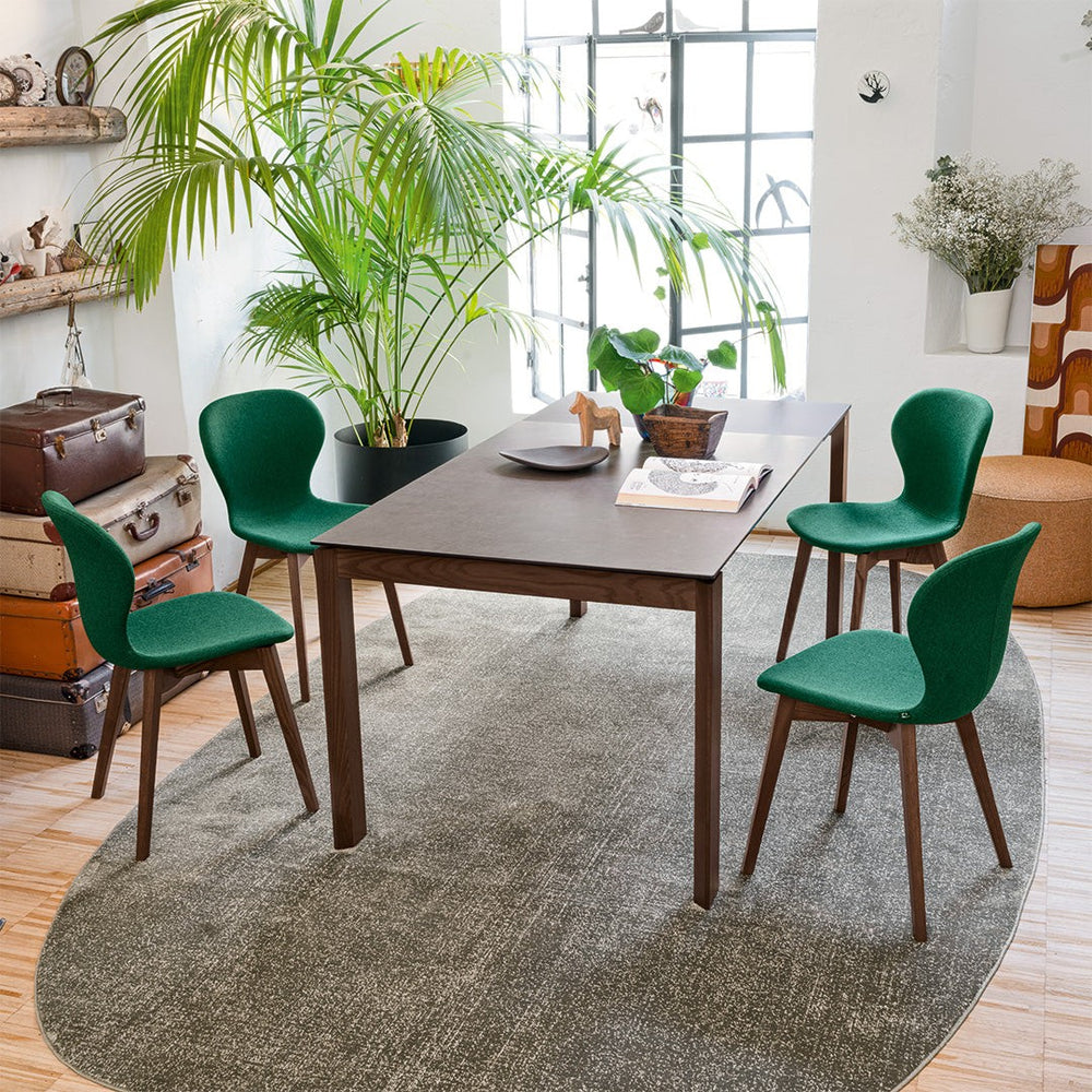 Eminence Wood Extendable Dining Table by Connubia in a styled interior