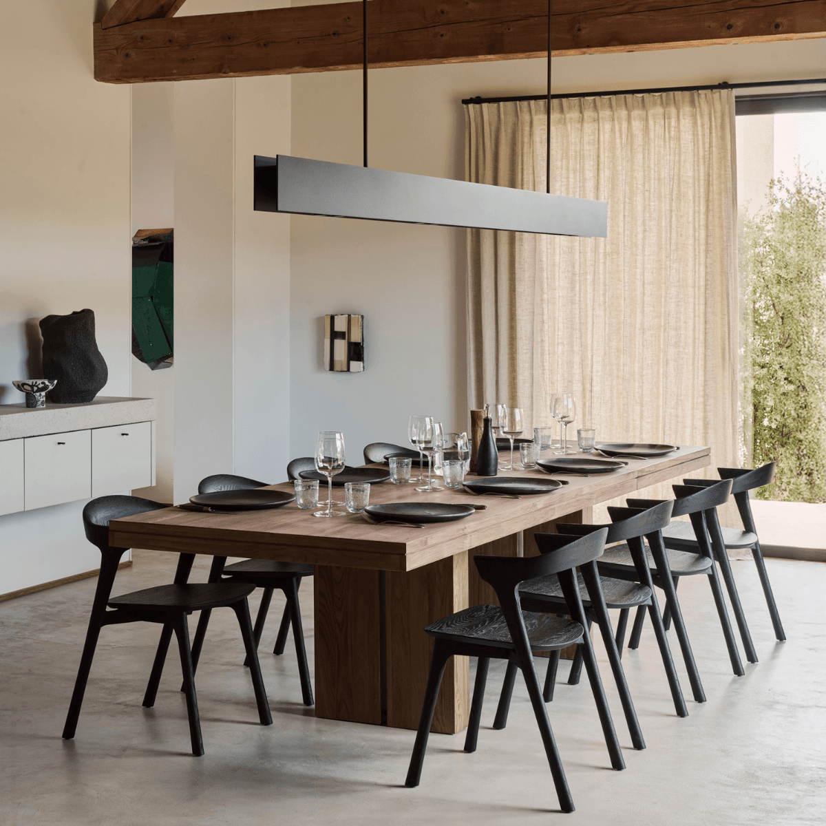 Ethnicraft extendable dining table in a contemporary room