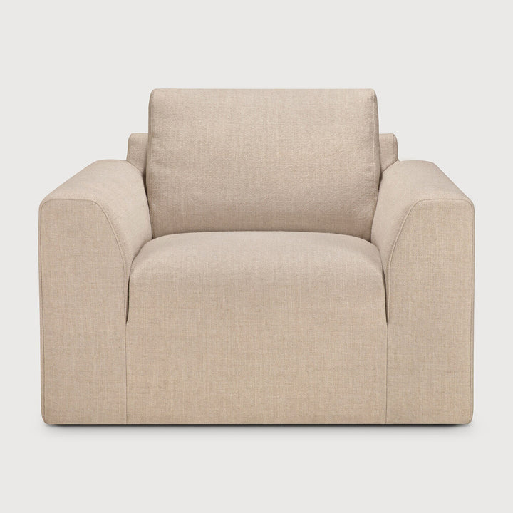 Ethnicraft Ease lounge chair in Leche upholstery on white background