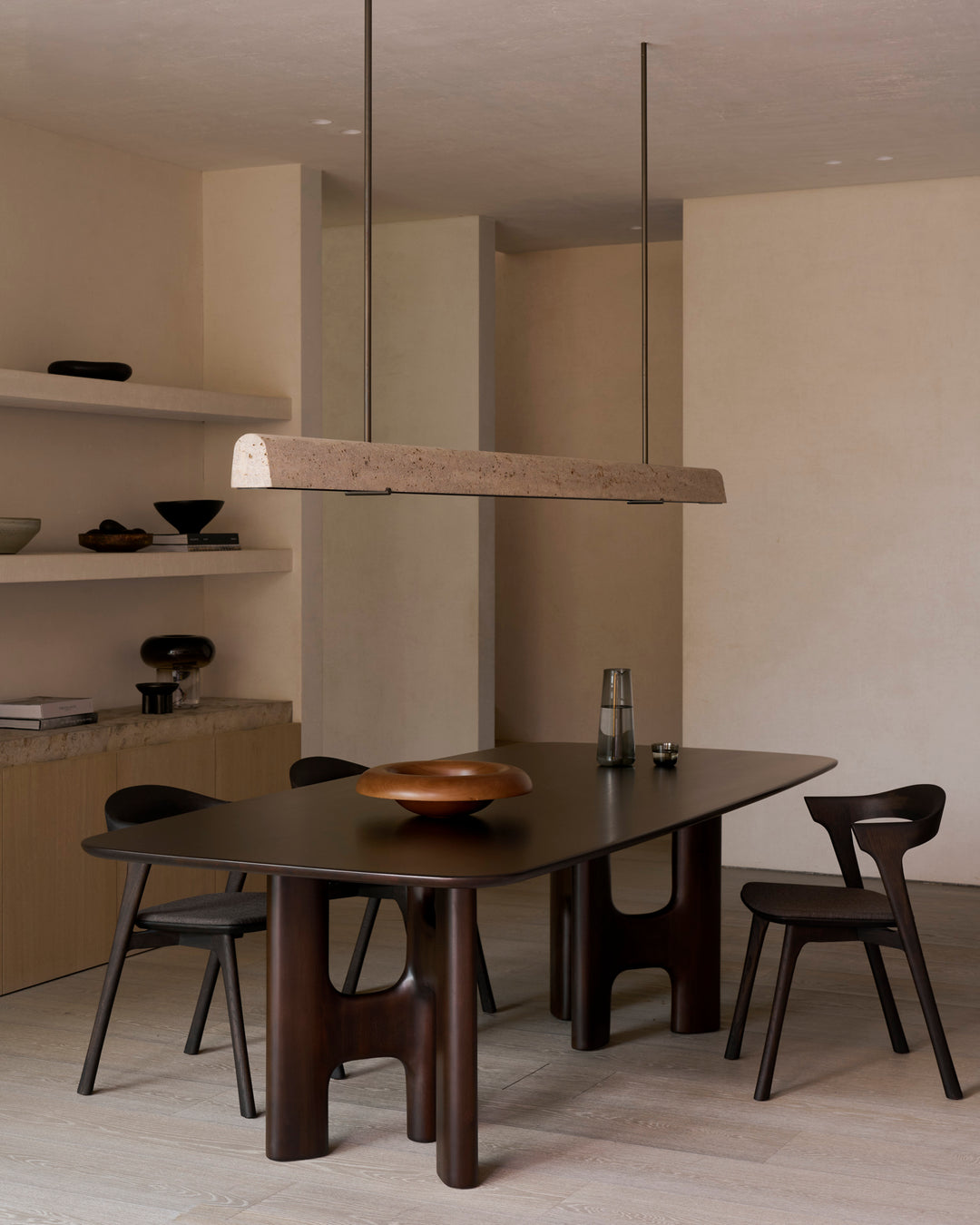 Ethnicraft Flow rose brown dining table in a styled dining room