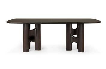Ethnicraft Flow mahogany rose brown dining table on a white background