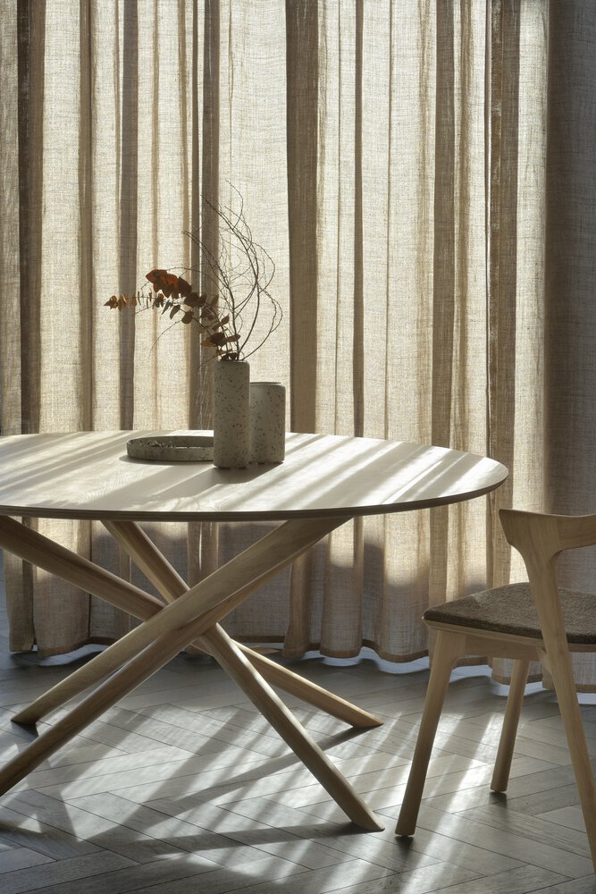 Ethnicraft Mikado dining table styled in a modern interior