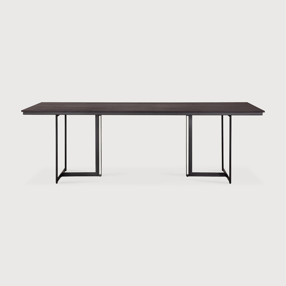 Ethnicraft Tacet dining table in dark brown teak on white background