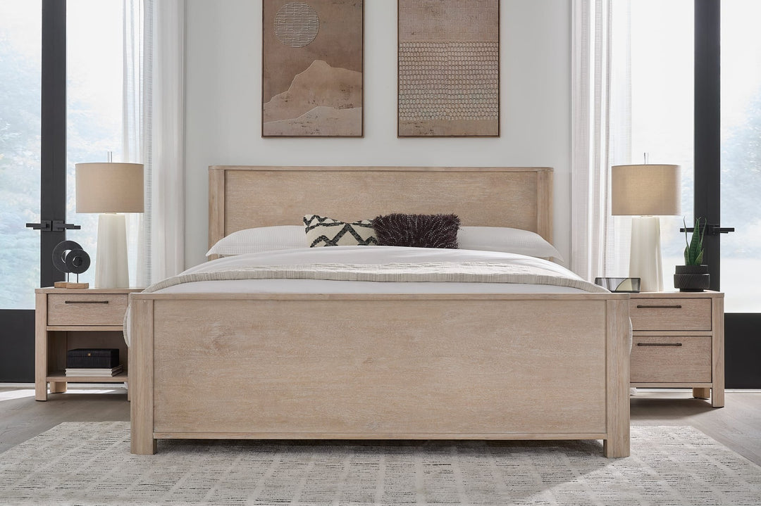 Evelyn Two Drawer Nightstand with Cord Management in Saltwood — in a bedroom setting