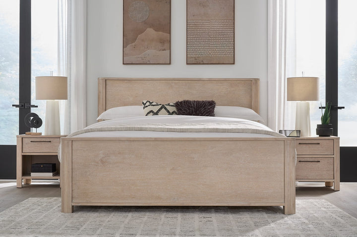 Evelyn Two Drawer Nightstand with Cord Management in Saltwood — in a bedroom setting