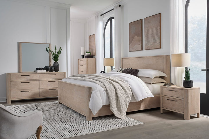 Evelyn Two Drawer Nightstand with Cord Management in Saltwood — in a bedroom setting