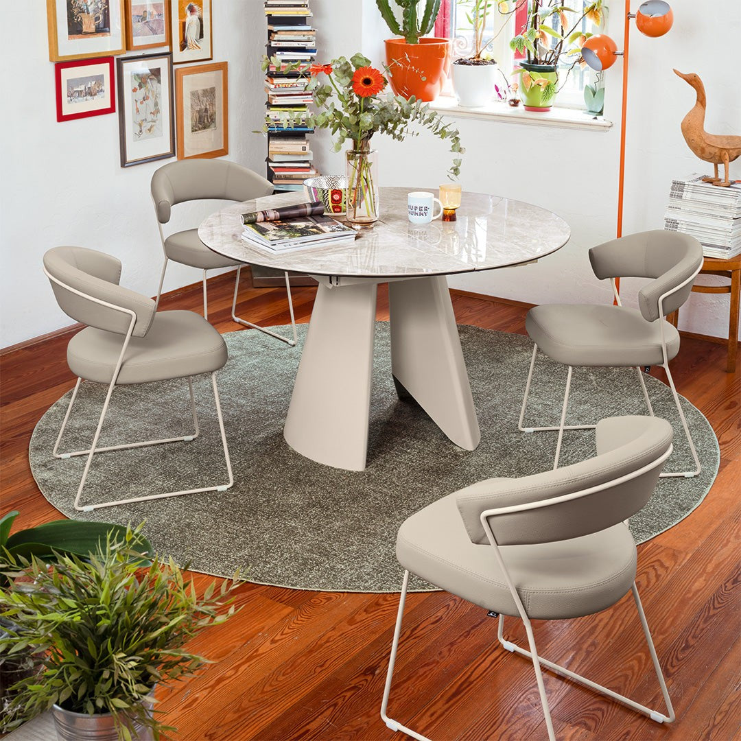 Frac Round Extendable Dining Table by Connubia in a styled interior