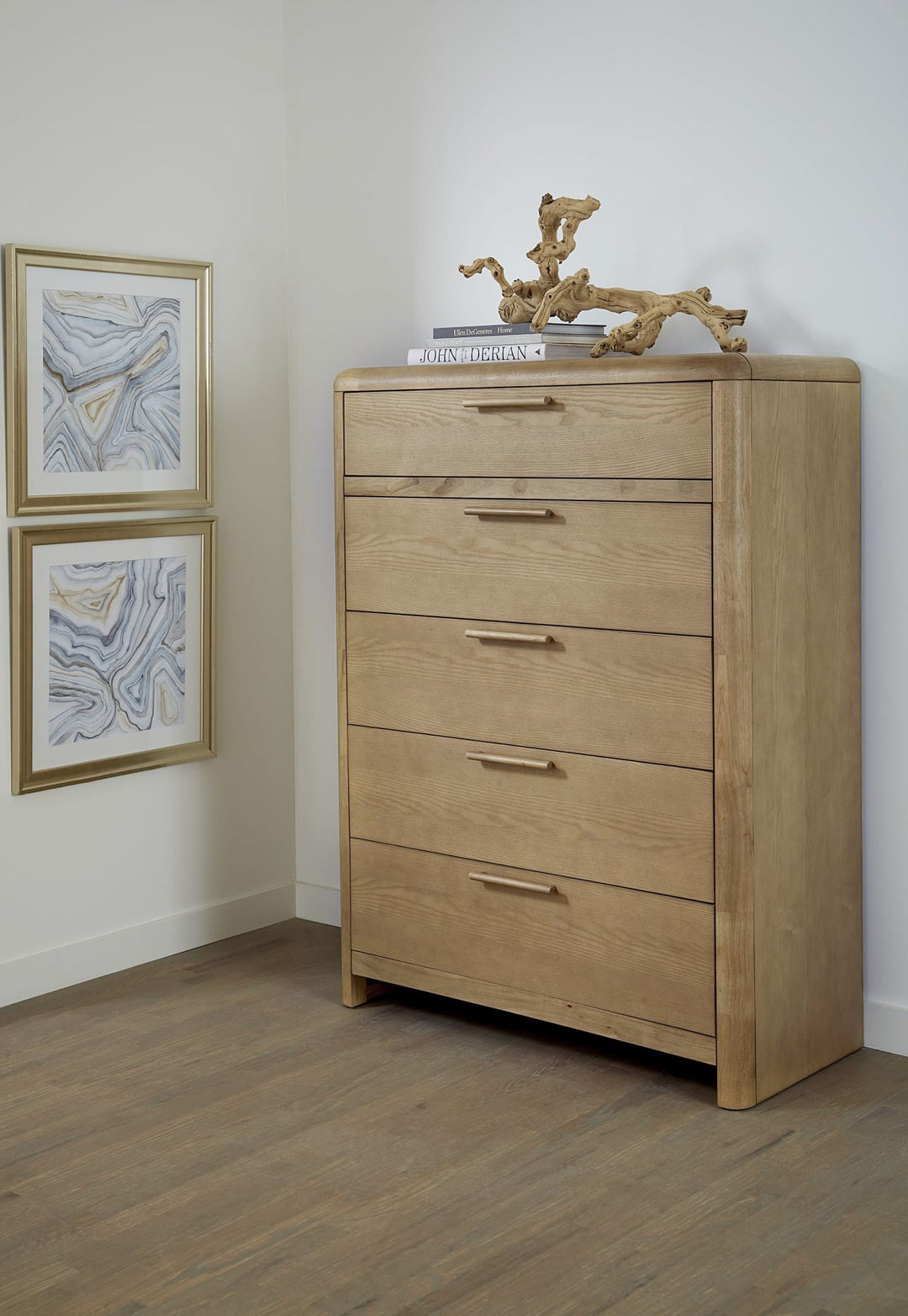 Furano Five Drawer Chest in Ginger styled in a bright bedroom