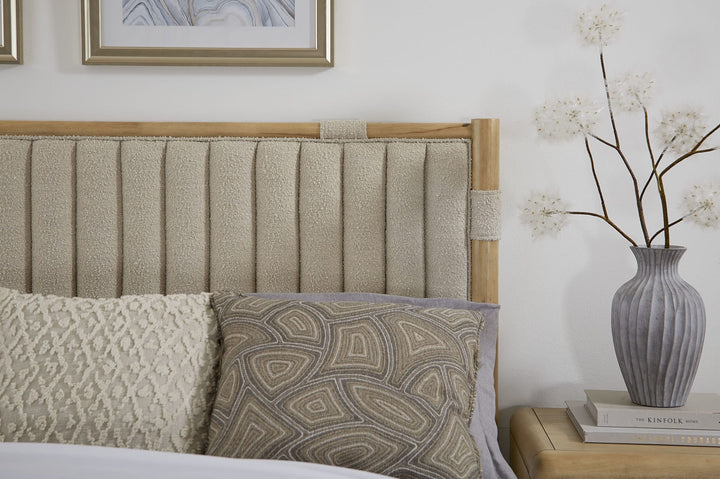 Furano Upholstered Panel Bed — close-up of the boucle upholstered headboard in a bedroom