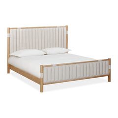 Furano Upholstered Panel Bed by Modus in Ginger and Brun Boucle — white background, angled view with bedding
