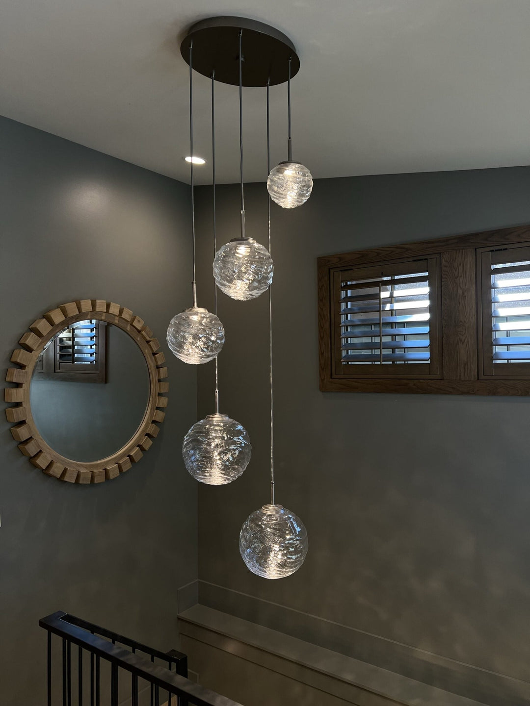 Gaia Round Pendant Chandelier by Hammerton Studio in a styled interior