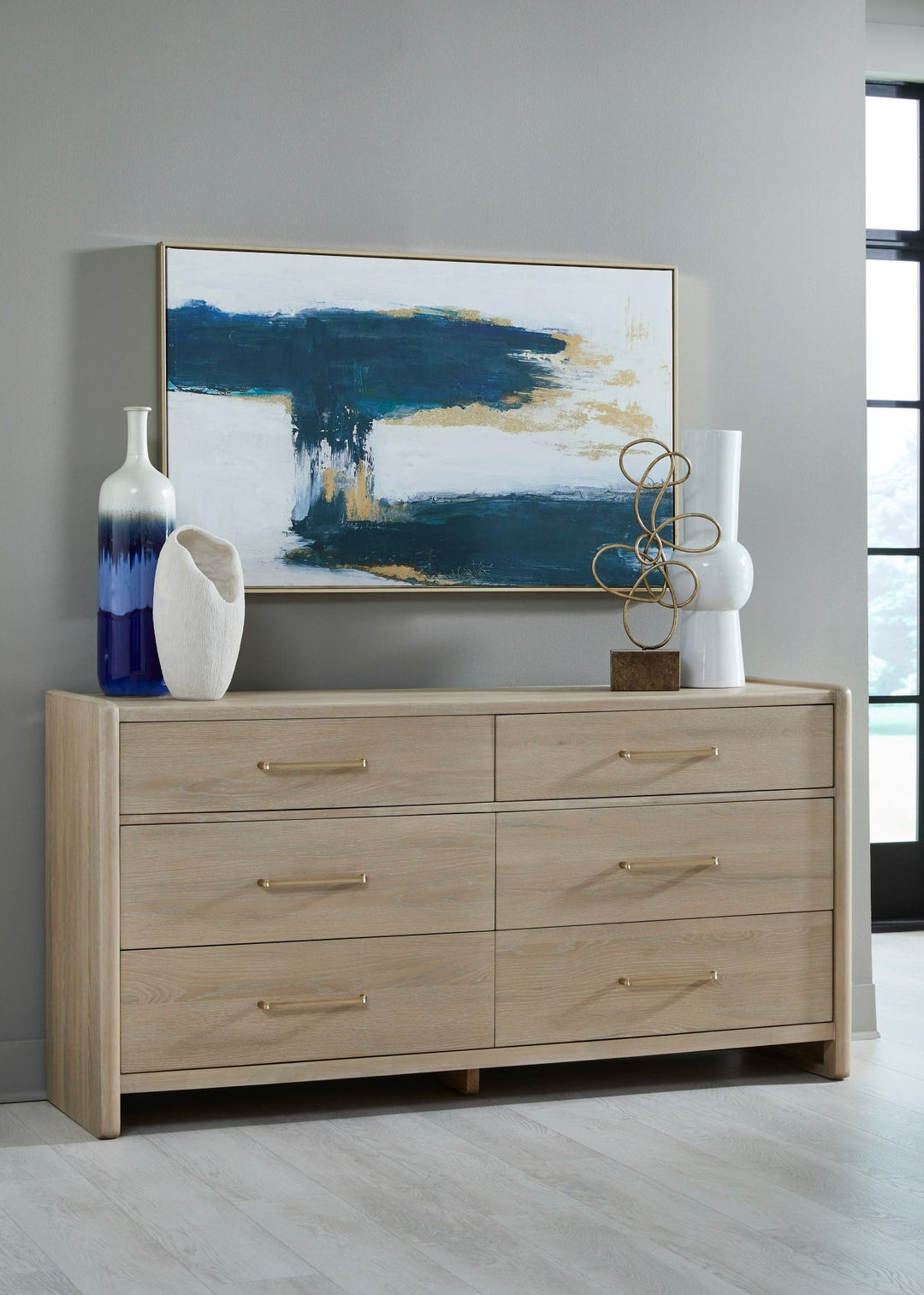 Gardenia Six Drawer Dresser in Chai — styled in a room