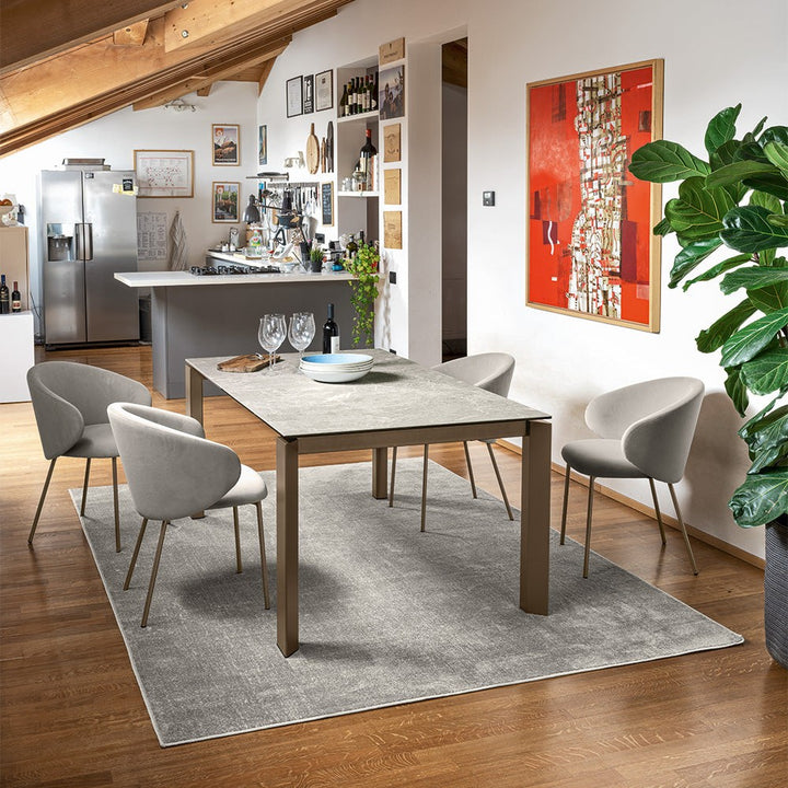 Gate Extendable Dining Table by Connubia in a styled interior
