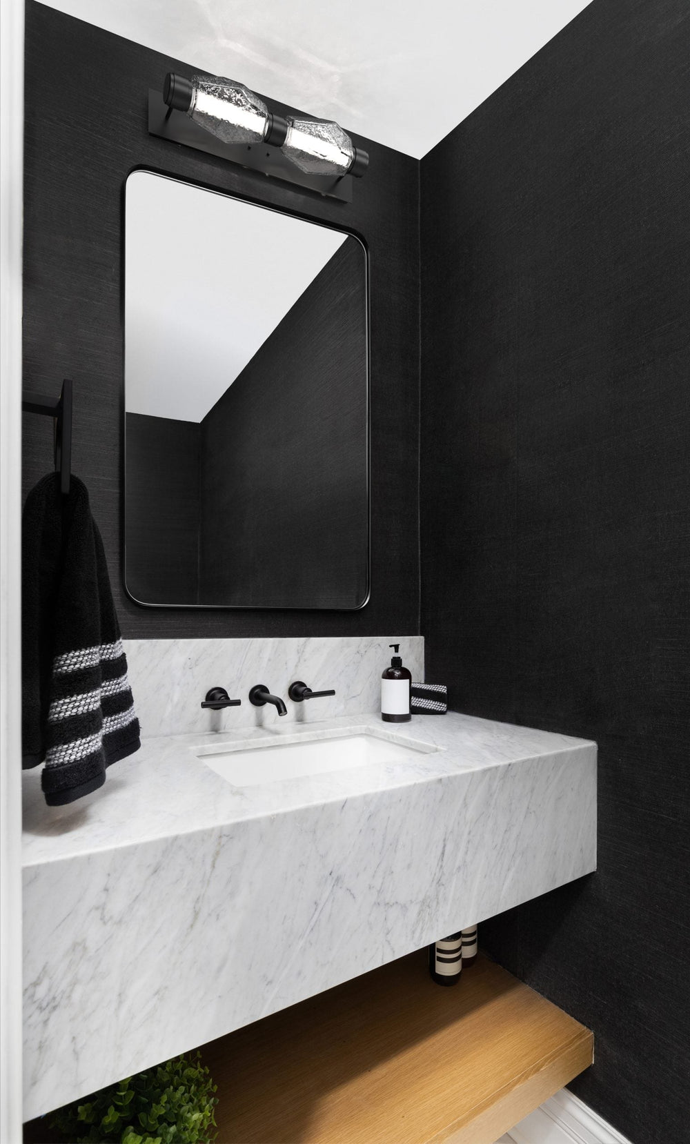 Gem Mandrel Double Sconce by Hammerton Studio in a styled interior