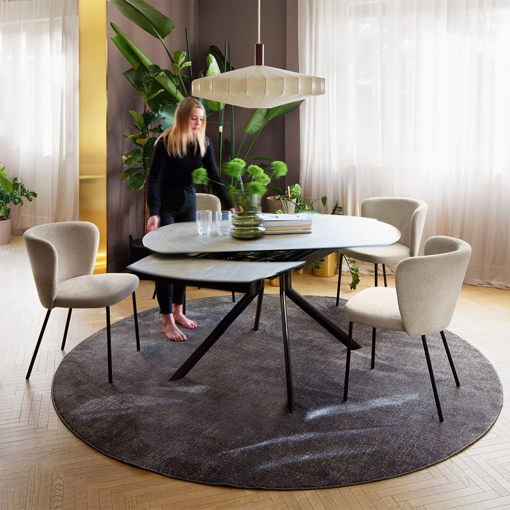 Giove Plus Oval Extendable Dining Table by Connubia in a styled interior