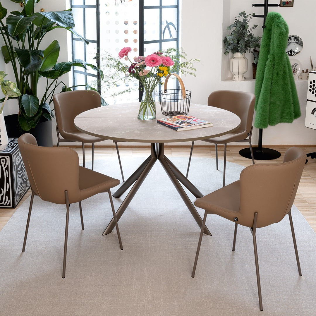 Giove Round Extendable Dining Table by Connubia in a styled interior