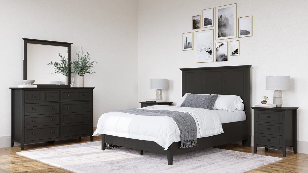 Grace Three Drawer Nightstand in Raven Black — in a bedroom setting