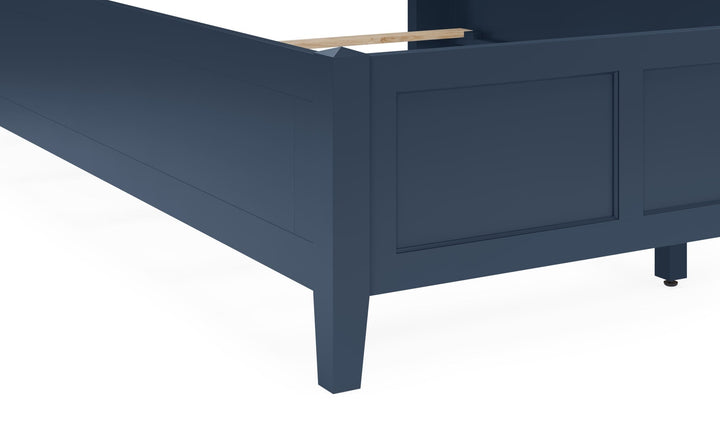 Grace Three Panel Bed in Blueberry — close-up of the footboard and leg