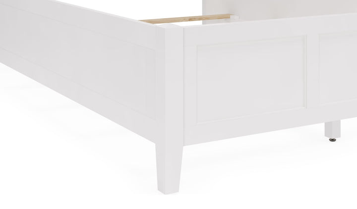 Grace Three Panel Bed in Snowfall White — close-up of the footboard and leg