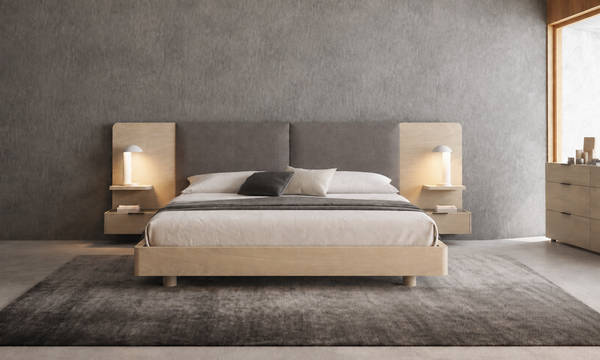 Hatley bed by Huppé with an upholstered extended headboard and integrated nightstands in a warm neutral bedroom