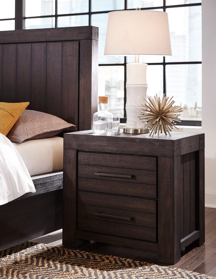 Heath Two Drawer Nightstand in Basalt Grey — in a bedroom setting