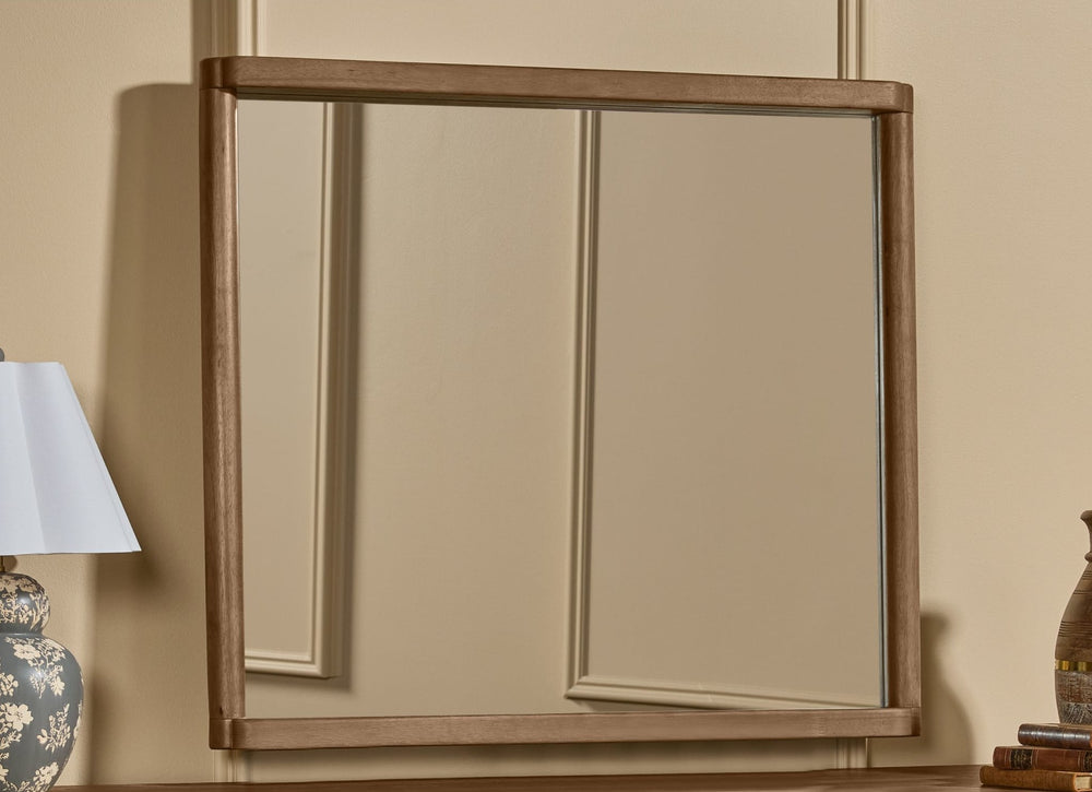 Hollis Dresser Mirror in Cabin Glow — styled in a room
