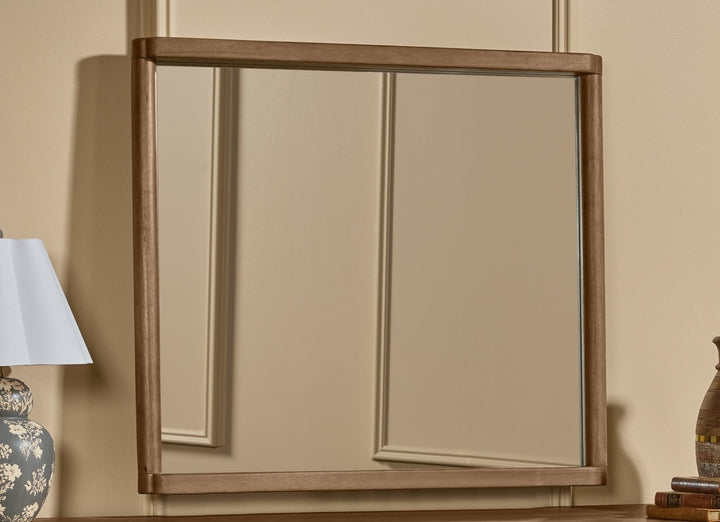 Hollis Dresser Mirror in Cabin Glow — styled in a room