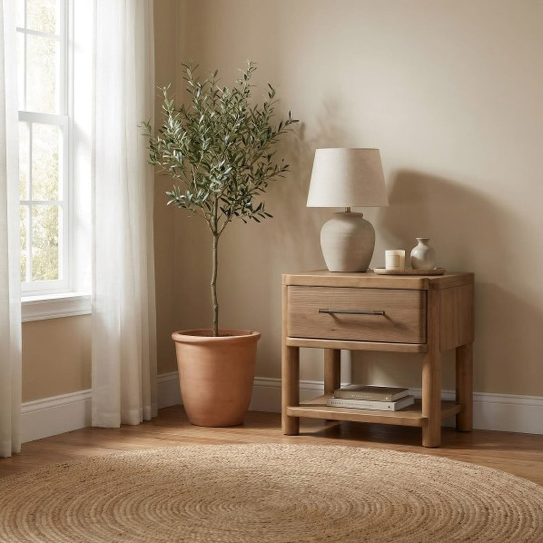 Hollis One Drawer Nightstand with Cord Management in Cabin Glow — in a bedroom setting