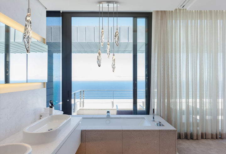 Icefall Round Pendant Chandelier by Hammerton Studio in a styled interior