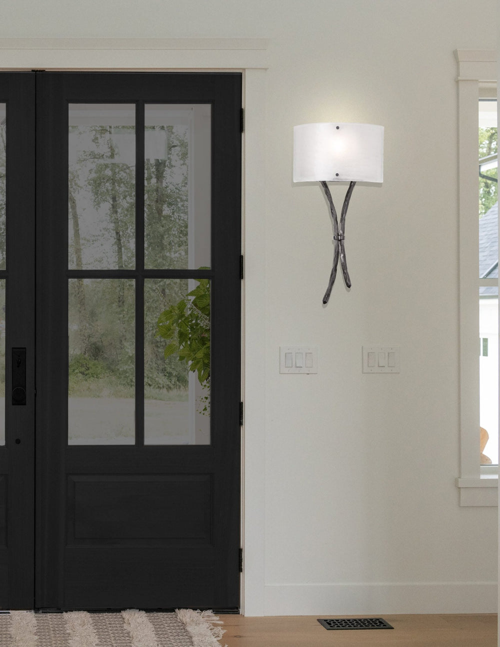 Ironwood Sprout Sconce by Hammerton Studio in a styled interior