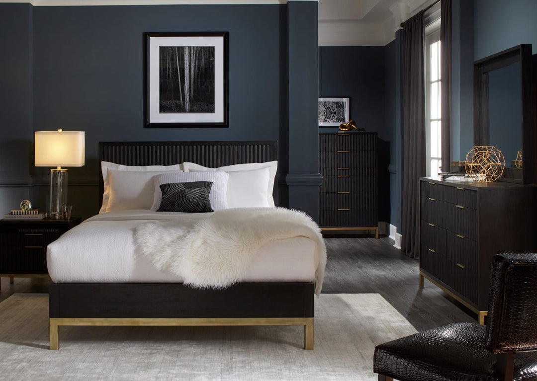 Kentfield Eight Drawer Dresser in Black Drifted Oak — in a bedroom setting