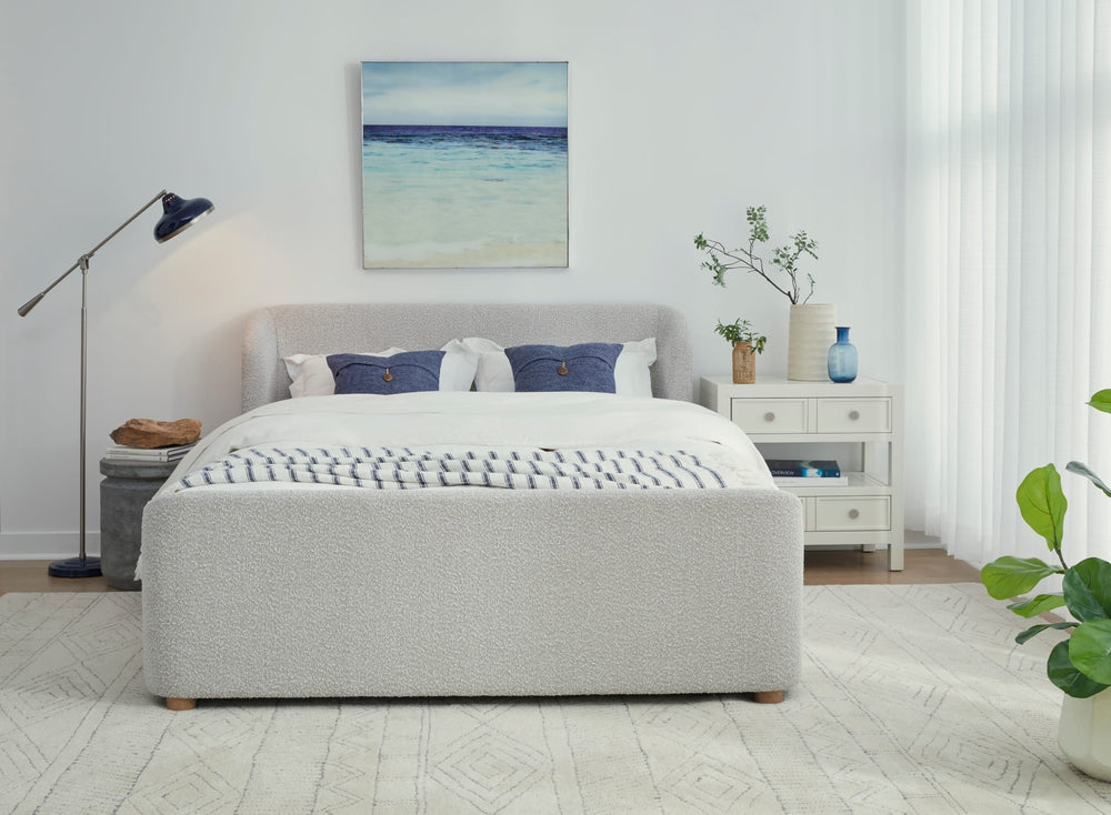 Kiki Upholstered Platform Bed in Cotton Ball Boucle styled in a bedroom