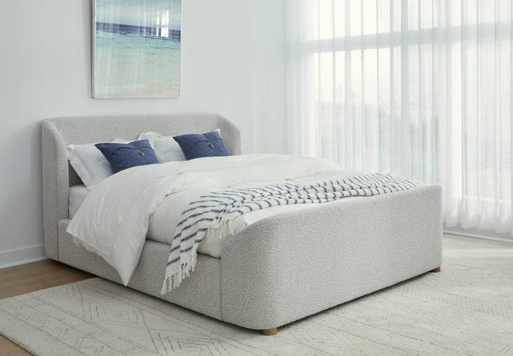 Kiki Upholstered Platform Bed in Cotton Ball Boucle styled in a bedroom