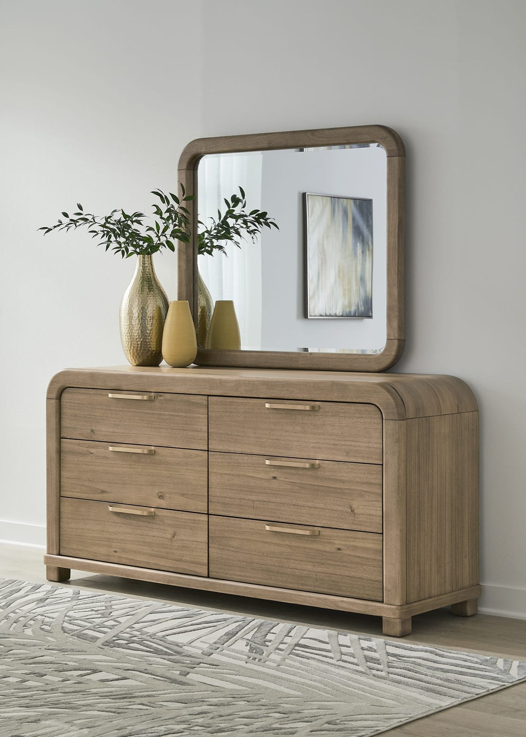 Kione Six Drawer Dresser in Lioness — styled with the matching mirror (sold separately)