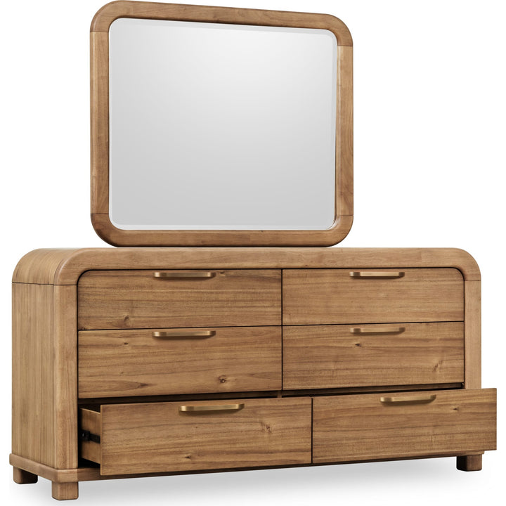 Kione Six Drawer Dresser in Lioness — with drawers open, shown with the matching mirror (sold separately)