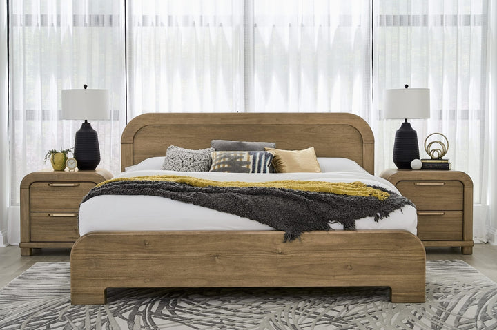 Kione Two Drawer Nightstand in Lioness — in a bedroom setting