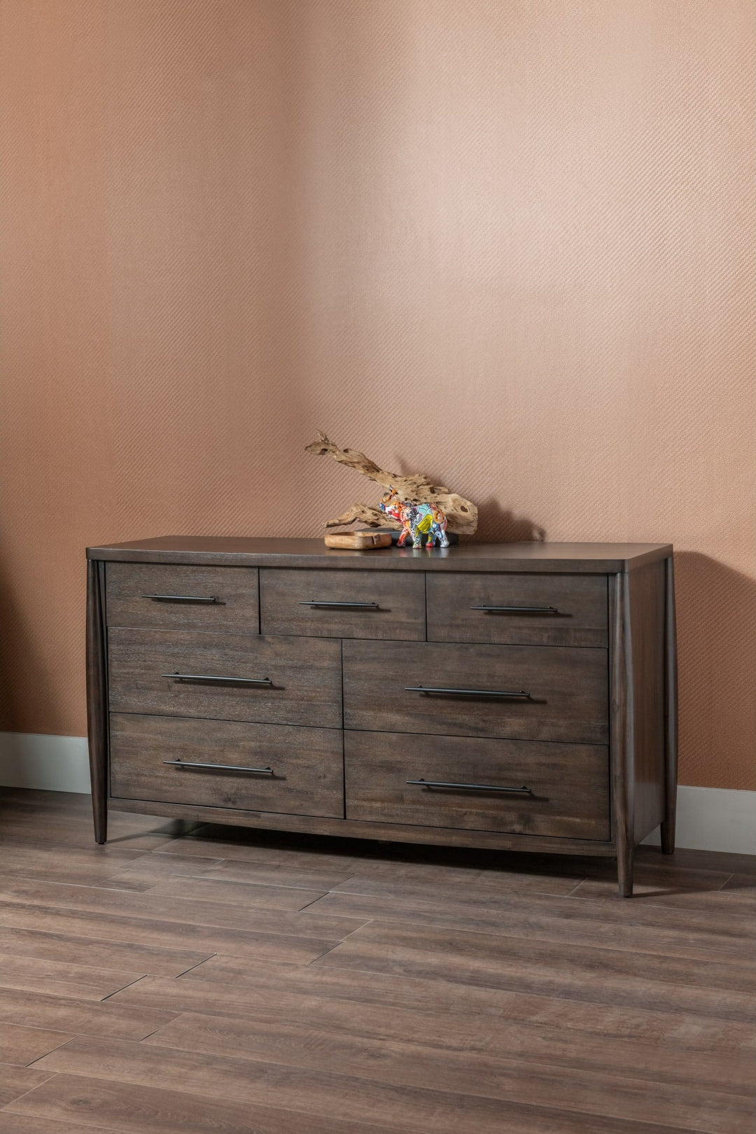 Koko Seven Drawer Dresser in Minx — styled in a room