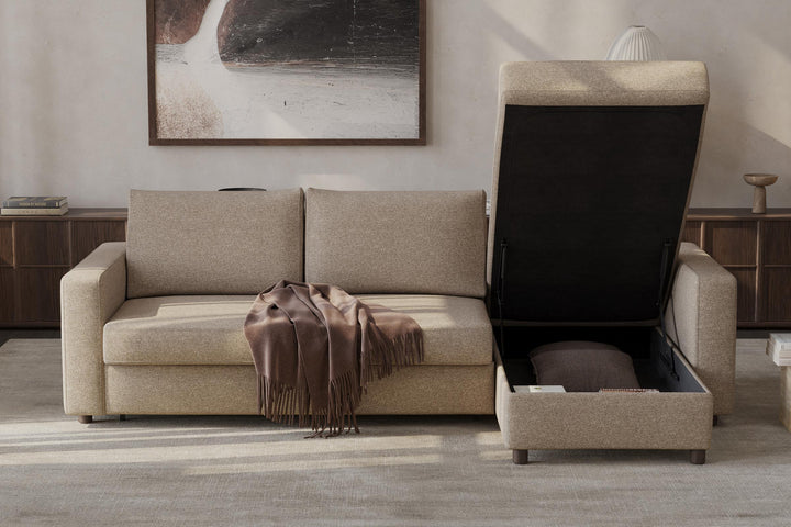 Neah Sleeper Chaise Sectional by Innovation Living in beige with the chaise lid lifted to show the storage box