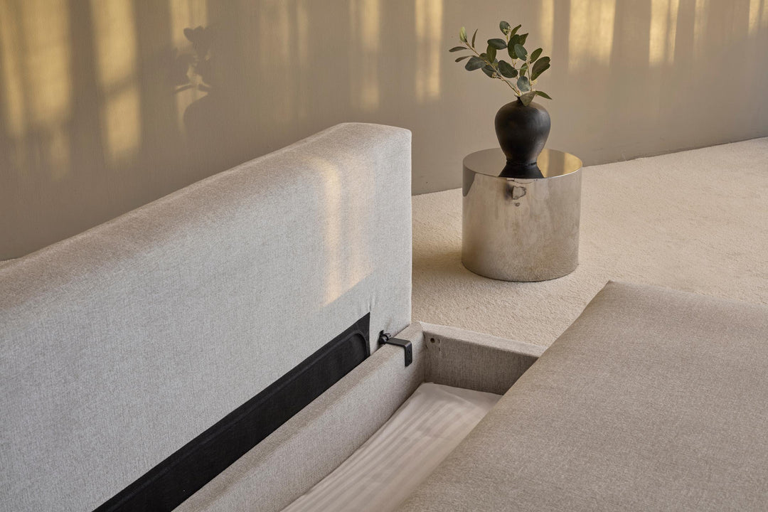 Osvald Sleeper Sofa by Innovation Living close-up of the storage compartment under the light grey seat
