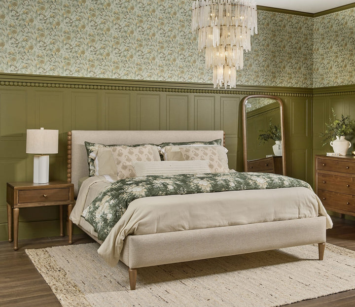 Langley Upholstered Bed styled in a bedroom