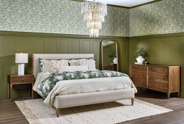 Langley Upholstered Bed styled in a bedroom