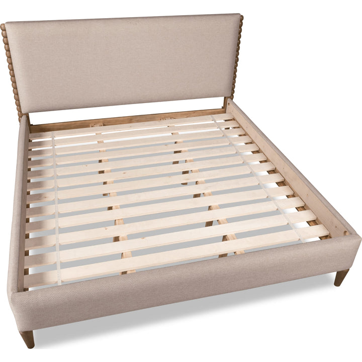 Langley Upholstered Bed — without mattress, showing slat platform