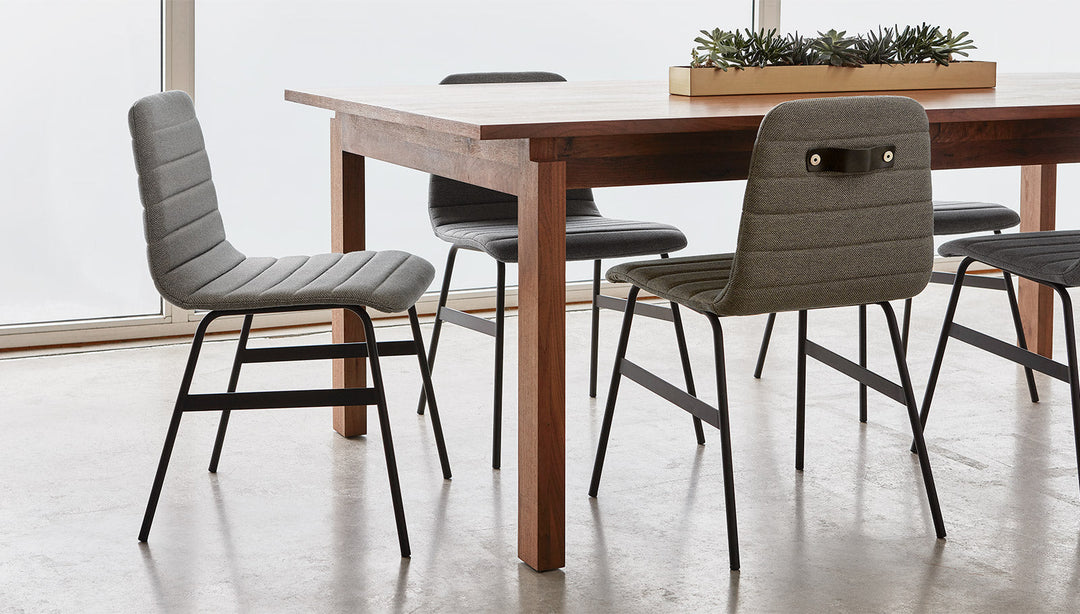 Lecture Upholstered Dining Chair by Gus Modern in a styled dining space