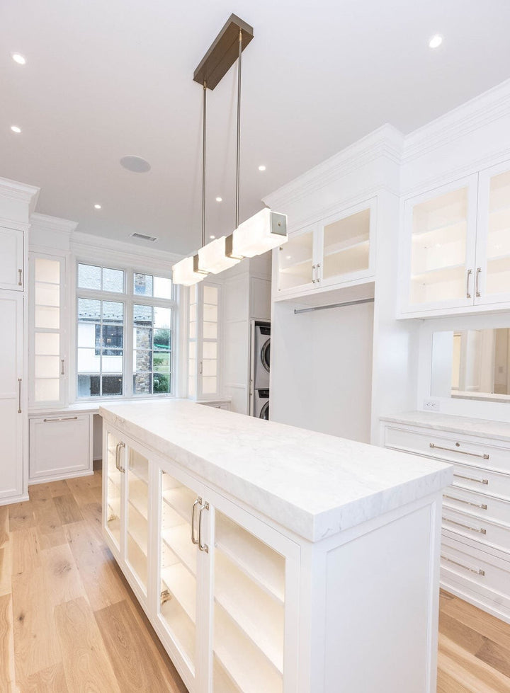 Ledgestone Linear Chandelier by Hammerton Studio in a styled interior