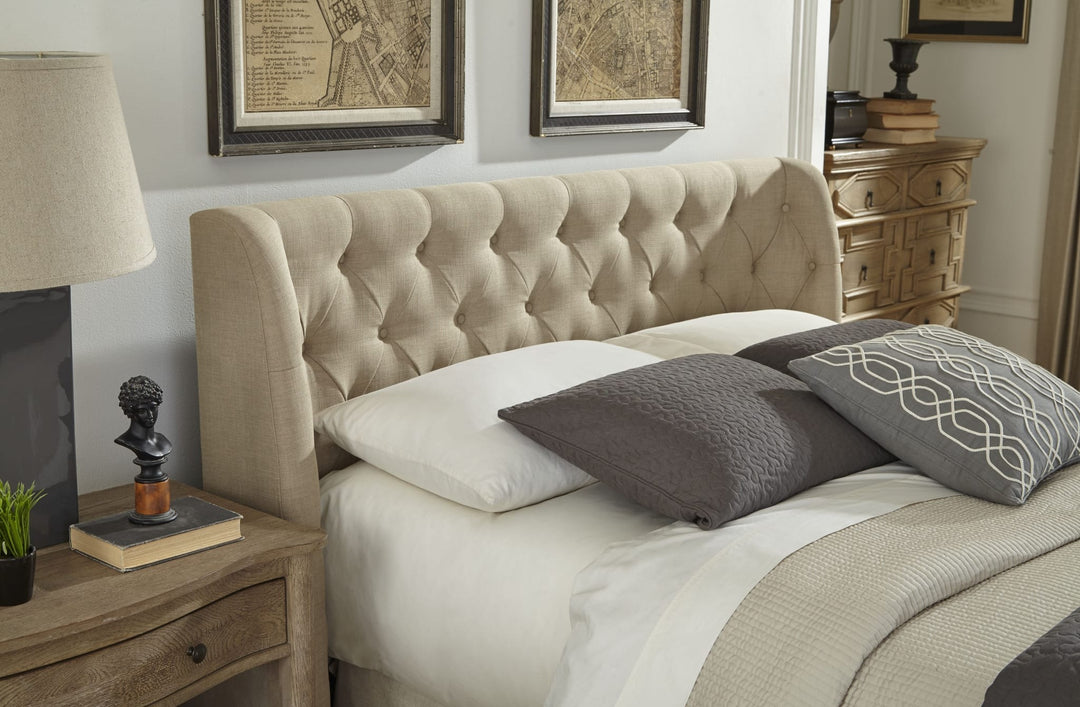 Levi Tufted Upholstered Footboard Storage Bed in Toast Linen styled in a bedroom