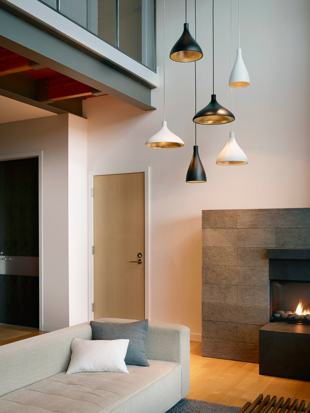 Swell Chandelier 3 by Pablo Designs in a modern living room