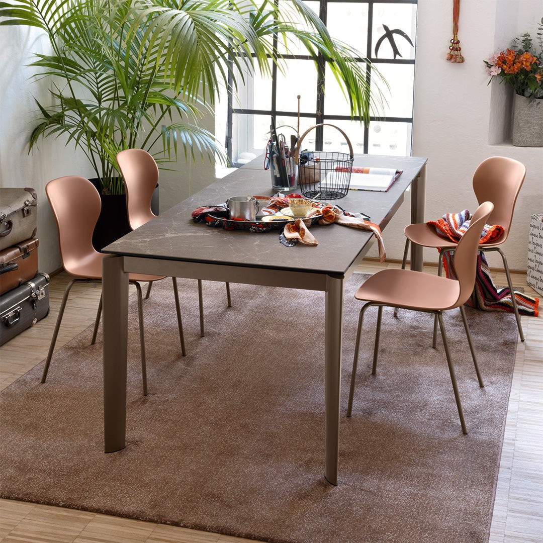 Lord Extendable Dining Table by Connubia in a styled interior