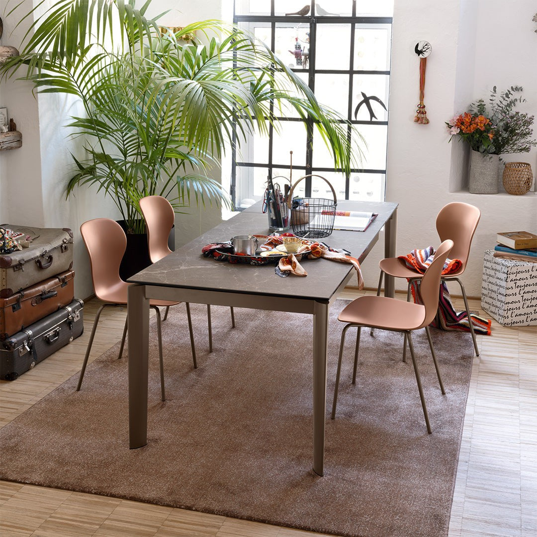 Lord Extendable Dining Table by Connubia in a styled interior
